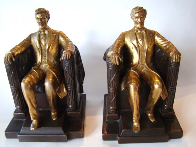 A fine pair of "Lincoln in the chair" antique bookends by Jennings Brothers circa 1930
